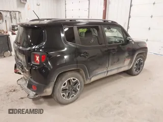 2015 Jeep Renegade Trailhawk with VIN ZACCJBCT7FPB35801, listed as a IAAI auction lot 41991084 with 119,887 mi miles and . Bid and sale history available at DreamBid. Image 4.