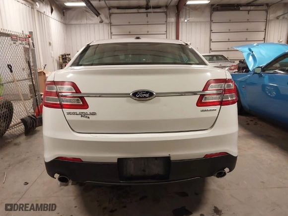 2014 Ford Taurus SE with VIN 1FAHP2D89EG178858, listed as a IAAI auction lot 40853995 with 136606 miles. Bid and sale history available at carsss.com. Image 17.