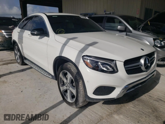 2019 Mercedes-Benz GLC with VIN WDC0J4KB1KF565029, listed as a Copart auction lot 52591042 with 22,588 mi miles. Bid and sale history available at carsss.com. Image 1.