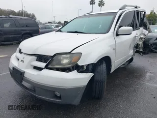 2003 Mitsubishi Outlander XLS with VIN JA4LX41G93U034215, listed as a IAAI auction lot 41788522 with 163,558 mi miles. Bid and sale history available at carsss.com. Image 2.