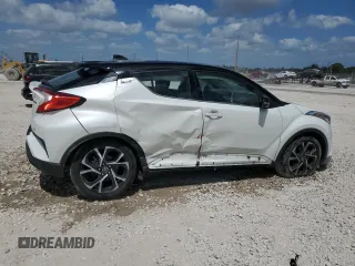 2019 Toyota C-HR XLE with VIN NMTKHMBX4KR100572, listed as a Copart auction lot 54371845 with 42,917 mi miles and Salvage Title. Bid and sale history available at DreamBid. Image 3.