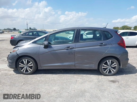 2019 Honda Fit EX with VIN 3HGGK5H87KM735382, listed as a IAAI auction lot 41972963 with 119,006 mi miles and . Bid and sale history available at DreamBid. Image 14.