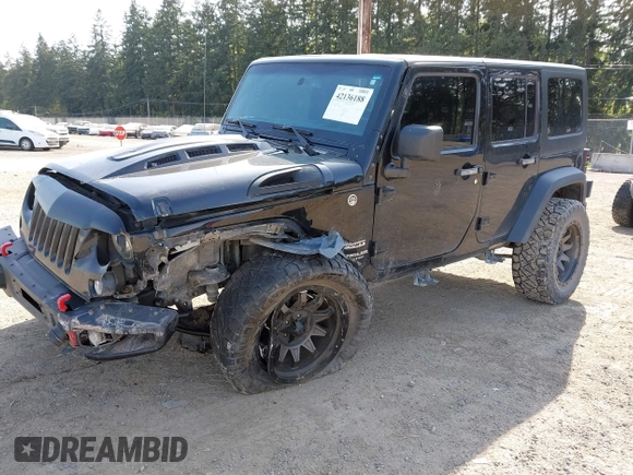 2015 Jeep Wrangler Unlimited Willys Wheeler with VIN 1C4BJWDG9FL750049, listed as a IAAI auction lot 42136188 with 115,328 mi miles and . Bid and sale history available at DreamBid. Image 2.