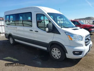 2020 Ford Transit Passenger XL with VIN 1FBAX2C85LKA42853, listed as a IAAI auction lot 42034055 with 65,181 mi miles and . Bid and sale history available at DreamBid. Image 1.