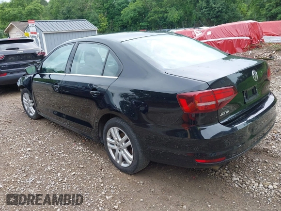 2017 Volkswagen Jetta S z VIN 3VW2B7AJ3HM303198, wystawiony jako IAAI lot #42651056 z przebiegiem 126 253 mil mil oraz . Historia ofert i sprzedaży dostępna na DreamBid. Obrazek 3.