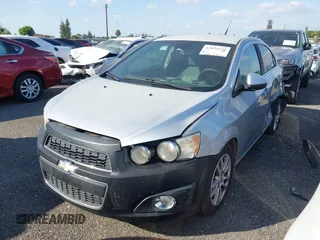 2012 Chevrolet Sonic LT with VIN 1G1JC5SH9C4136290, listed as a IAAI auction lot 42034254 with 273,427 mi miles and . Bid and sale history available at DreamBid. Image 2.