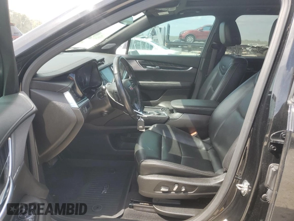 2023 Cadillac XT6 FWD Premium Luxury with VIN 1GYKPCRS6PZ127331, listed as a Copart auction lot 52951105 with 47,796 mi miles and Salvage Title. Bid and sale history available at carsss.com. Image 7.