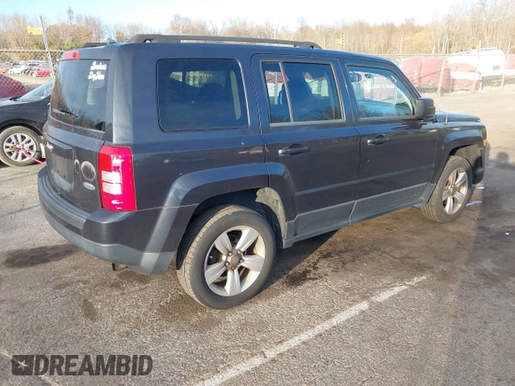 2014 Jeep Patriot Latitude with VIN 1C4NJRFB4ED720241, listed as a IAAI auction lot 40914199 with 128,218 mi miles. Bid and sale history available at carsss.com. Image 4.