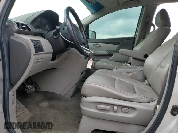 2011 Honda Odyssey EX-L with VIN 5FNRL5H63BB098661, listed as a Copart auction lot 52566345 with 177,071 mi miles and Salvage Title. Bid and sale history available at DreamBid. Image 7.