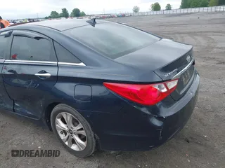 2013 Hyundai Sonata Limited with VIN 5NPEC4AC0DH559912, listed as a IAAI auction lot 42218654 with 156,802 mi miles and . Bid and sale history available at carsss.com. Image 14.