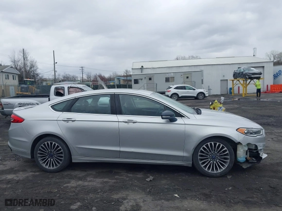 2018 Ford Fusion Titanium with VIN 3FA6P0D99JR139114, listed as a IAAI auction lot 41991248 with 142,324 mi miles. Bid and sale history available at carsss.com. Image 13.