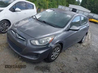 2014 Hyundai Accent GS with VIN KMHCT5AE3EU141605, listed as a IAAI auction lot 42157550 with 174,197 mi miles. Bid and sale history available at carsss.com. Image 2.