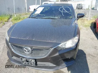 2016 Mazda 6 i Sport with VIN JM1GJ1U57G1425243, listed as a IAAI auction lot 41901771 with 135,155 mi miles and . Bid and sale history available at DreamBid. Image 12.