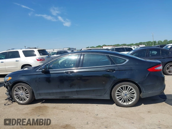 2015 Ford Fusion SE z VIN 3FA6P0H92FR247432, wystawiony jako IAAI lot #42044461 z przebiegiem 148 616 mil mil oraz . Historia ofert i sprzedaży dostępna na DreamBid. Obrazek 14.