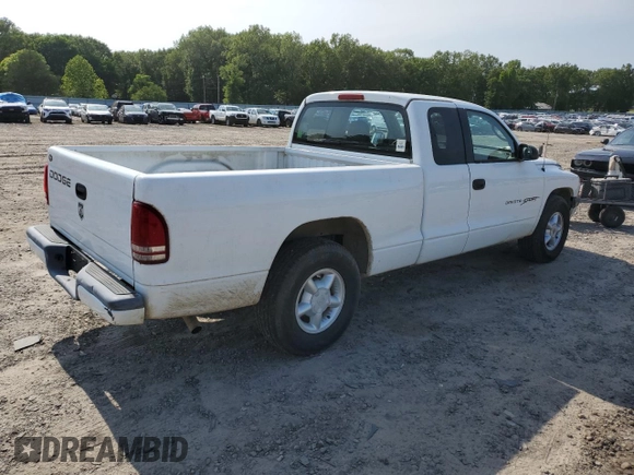 2001 Dodge Dakota z VIN 1B7GL22X21S128774, wystawiony jako Copart lot #58313685 z przebiegiem 167 355 mil mil oraz Czysty tytuł • Clean title. Historia ofert i sprzedaży dostępna na DreamBid. Obrazek 3.