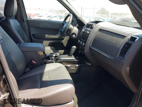 2012 Ford Escape Limited z VIN 1FMCU0EG0CKC18936, wystawiony jako IAAI lot #42303201 z przebiegiem 132 416 mil mil oraz . Historia ofert i sprzedaży dostępna na DreamBid. Obrazek 5.