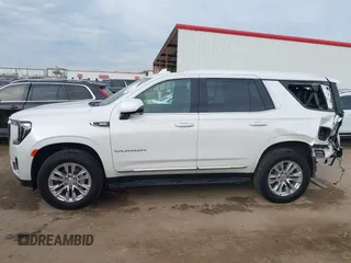 2021 GMC Yukon SLT with VIN 1GKS1BKD1MR489922, listed as a IAAI auction lot 40972652 with 77,791 mi miles. Bid and sale history available at carsss.com. Image 14.