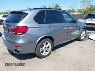 2015 BMW X5 xDrive50i z VIN 5UXKR6C59F0J76691, wystawiony jako IAAI lot #41857319 z przebiegiem 32 830 mil mil oraz . Historia ofert i sprzedaży dostępna na DreamBid. Obrazek 4.