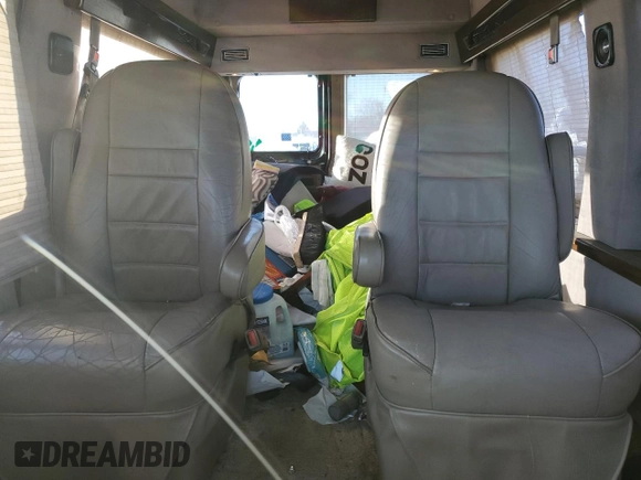 2000 Ford Econoline Cargo with VIN 1FDRE14W9YHA92344, listed as a Copart auction lot 83749374 with 164,823 mi miles and Salvage Title. Bid and sale history available at DreamBid. Image 10.