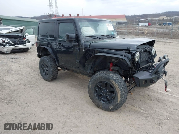 2014 Jeep Wrangler Sahara with VIN 1C4AJWBG9EL311477, listed as a IAAI auction lot 41884255 with 82,221 mi miles and . Bid and sale history available at carsss.com. Image 1.