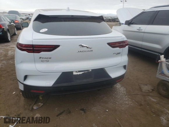 2020 Jaguar I-Pace SE с VIN SADHC2S13L1F85464, выставлен на аукционе Copart как лот 81758543 с пробегом 32 784 миль миль и . История ставок и продаж доступна на DreamBid. Изображение 6.