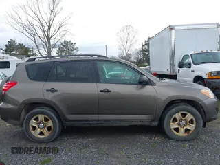 2011 Toyota RAV4 with VIN 2T3BK4DV1BW048945, listed as a IAAI auction lot 42047540 with 215,032 mi miles. Bid and sale history available at carsss.com. Image 13.
