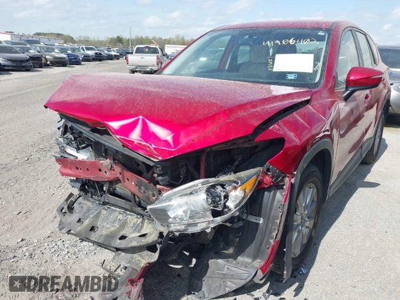 2016 Mazda CX-5 Sport with VIN JM3KE2BY9G0911535, listed as a IAAI auction lot 41906402 with 134,477 mi miles. Bid and sale history available at carsss.com. Image 6.