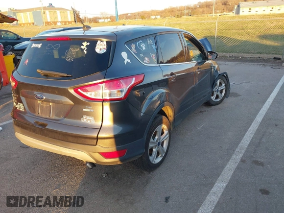 2016 Ford Escape SE with VIN 1FMCU9GX5GUB76100, listed as a IAAI auction lot 41079009 with 1 mi miles. Bid and sale history available at carsss.com. Image 4.