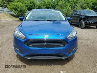 2018 Ford Focus SE with VIN 1FADP3FEXJL282378, listed as a Copart auction lot 59371975 with 30,029 mi miles and Salvage title. Bid and sale history available at DreamBid. Image 5.
