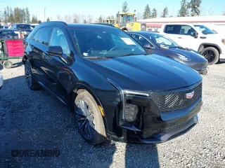 2024 Cadillac XT4 AWD Sport with VIN 1GYFZFR44RF198384, listed as a IAAI auction lot 41691257 with 5,400 mi miles and . Bid and sale history available at DreamBid. Image 1.