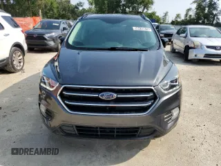2019 Ford Escape SE z VIN 1FMCU0GD9KUA52728, wystawiony jako Copart lot #58410975 z przebiegiem 109 483 mil mil oraz Czysty tytuł • Clean title. Historia ofert i sprzedaży dostępna na DreamBid. Obrazek 5.