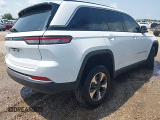 2023 Jeep Grand Cherokee with VIN 1C4RJYB63PC649000, listed as a IAAI auction lot 42306975 with 29,948 mi miles and . Bid and sale history available at DreamBid. Image 4.