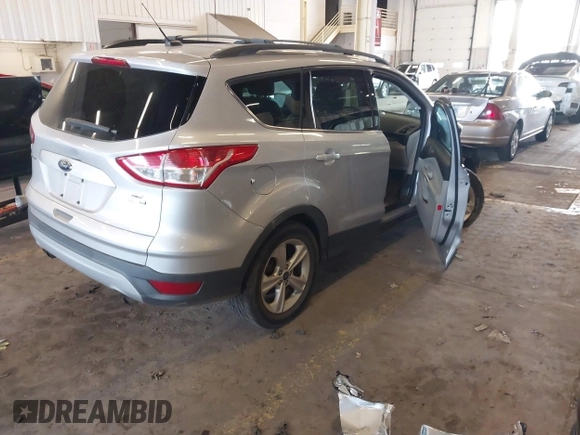 2013 Ford Escape SE z VIN 1FMCU9GX8DUD56926, wystawiony jako IAAI lot #41871248 z przebiegiem 36 807 mil mil oraz . Historia ofert i sprzedaży dostępna na DreamBid. Obrazek 4.