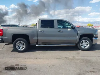 2017 Chevrolet Silverado 1500 LT with VIN 3GCUKREC2HG173402, listed as a IAAI auction lot 42041848 with 40,358 mi miles and . Bid and sale history available at DreamBid. Image 14.