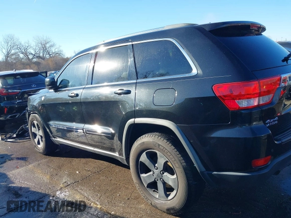 2011 Jeep Grand Cherokee 70th Anniversary with VIN 1J4RR4GT8BC504618, listed as a IAAI auction lot 40993960 with 188,098 mi miles. Bid and sale history available at carsss.com. Image 14.