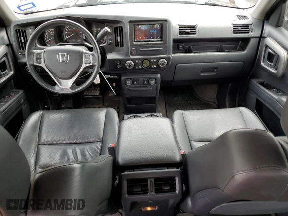 2011 Honda Ridgeline RTL with VIN 5FPYK1F52BB009042, listed as a Copart auction lot 69439004 with 119,889 mi miles and Salvage Title. Bid and sale history available at carsss.com. Image 8.