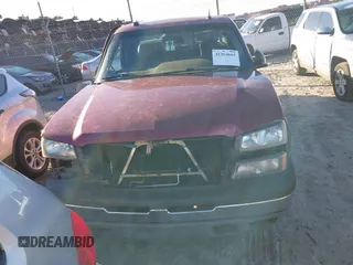 2004 Chevrolet Silverado 1500 with VIN 1GCEK19T34E387798, listed as a IAAI auction lot 41264663 with 308,522 mi miles and . Bid and sale history available at DreamBid. Image 12.