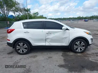 2013 Kia Sportage EX with VIN KNDPC3A21D7528487, listed as a IAAI auction lot 42556813 with 144,823 mi miles and . Bid and sale history available at DreamBid. Image 13.