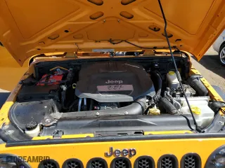 2012 Jeep Wrangler Unlimited Sport with VIN 1C4BJWDG8CL207111, listed as a Copart auction lot 51208395 with 87,926 mi miles and Salvage Title. Bid and sale history available at carsss.com. Image 12.