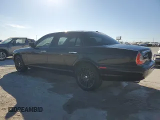 2007 Jaguar XJ with VIN SAJWA79B37SH16768, listed as a Copart auction lot 42048925 with 77,938 mi miles and Salvage Title. Bid and sale history available at carsss.com. Image 2.