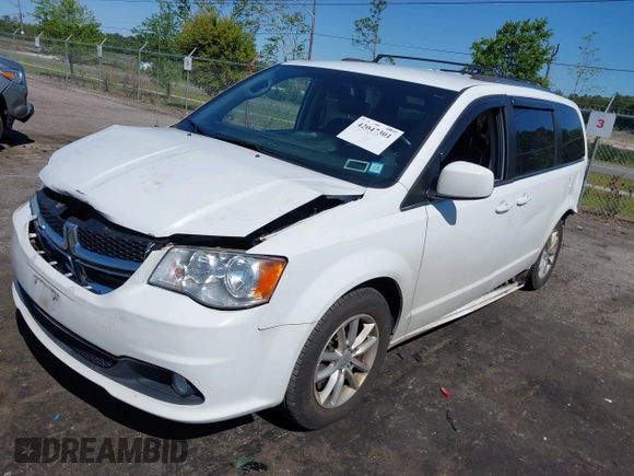 2018 Dodge Grand Caravan SXT with VIN 2C4RDGCG1JR326457, listed as a IAAI auction lot 42047301 with 84,518 mi miles and . Bid and sale history available at DreamBid. Image 17.