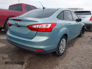 2012 Ford Focus SE with VIN 1FAHP3F2XCL470215, listed as a IAAI auction lot 41094147 with 139,653 mi miles and . Bid and sale history available at DreamBid. Image 4.