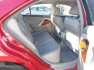 2009 Toyota Camry LE z VIN 4T1BK46K79U083690, wystawiony jako IAAI lot #41811918 z przebiegiem 174 220 mil mil oraz . Historia ofert i sprzedaży dostępna na DreamBid. Obrazek 8.