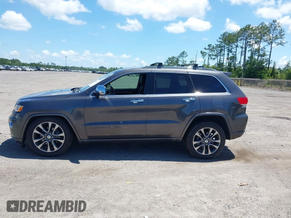 2017 Jeep Grand Cherokee Overland with VIN 1C4RJFCG2HC641791, listed as a IAAI auction lot 42566654 with 116,764 mi miles and . Bid and sale history available at DreamBid. Image 14.
