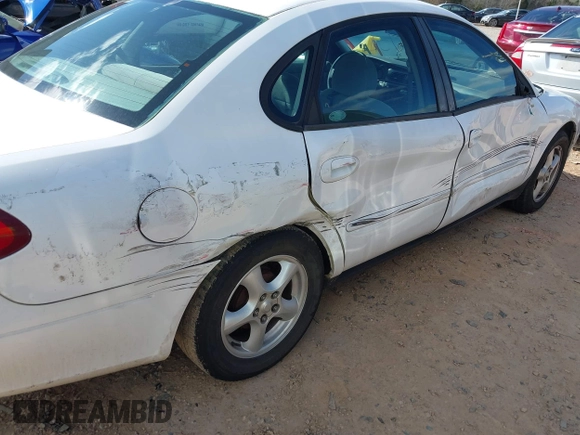2003 Ford Taurus SE Standard with VIN 1FAFP53223A203718, listed as a IAAI auction lot 41708811 with 200,413 mi miles. Bid and sale history available at carsss.com. Image 6.