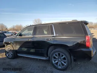 2015 Chevrolet Tahoe LTZ with VIN 1GNSKCKC6FR567840, listed as a Copart auction lot 43064285 with 131,071 mi miles and Salvage Title. Bid and sale history available at carsss.com. Image 2.