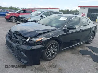 2021 Toyota Camry SE Nightshade with VIN 4T1G11AK2MU471174, listed as a IAAI auction lot 41740546 with 77,037 mi miles. Bid and sale history available at carsss.com. Image 2.