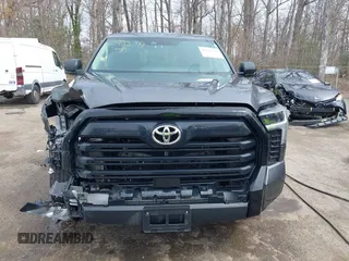 2023 Toyota Tundra with VIN 5TFKB5GDXPX002218, listed as a IAAI auction lot 41932719 with 71,335 mi miles and . Bid and sale history available at DreamBid. Image 12.