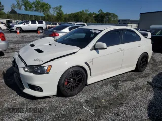 2014 Mitsubishi Lancer Evolution GSR z VIN JA32W8FV6EU017487, wystawiony jako Copart lot #52066995 z przebiegiem 44 332 mil mil oraz Szkody całkowita. Historia ofert i sprzedaży dostępna na DreamBid. Obrazek 1.