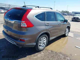 2015 Honda CR-V EX-L with VIN 2HKRM3H7XFH519437, listed as a IAAI auction lot 41656984 with 143,107 mi miles. Bid and sale history available at carsss.com. Image 4.
